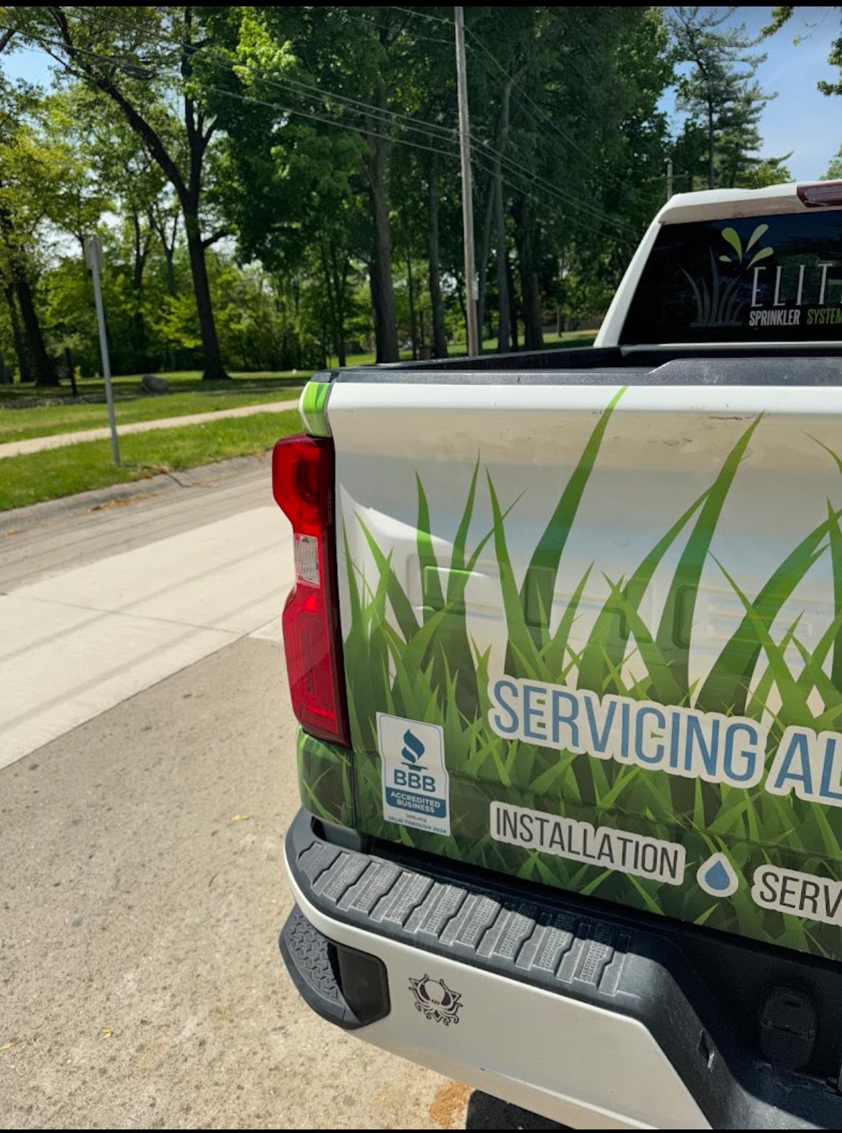 Elite Sprinkler Systems BBB accredited service truck arriving for sprinkler winterization in Metro Detroit, Michigan.